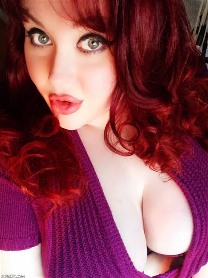 Busty Redhead Cleavage