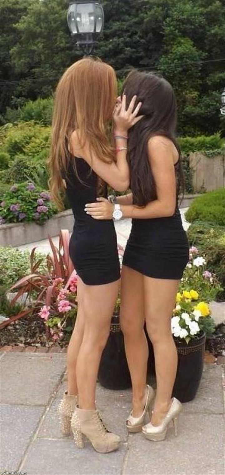 Lesbian seduces reluctant straight in short skirt