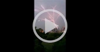 Lightning fills the sky over downtown Austin